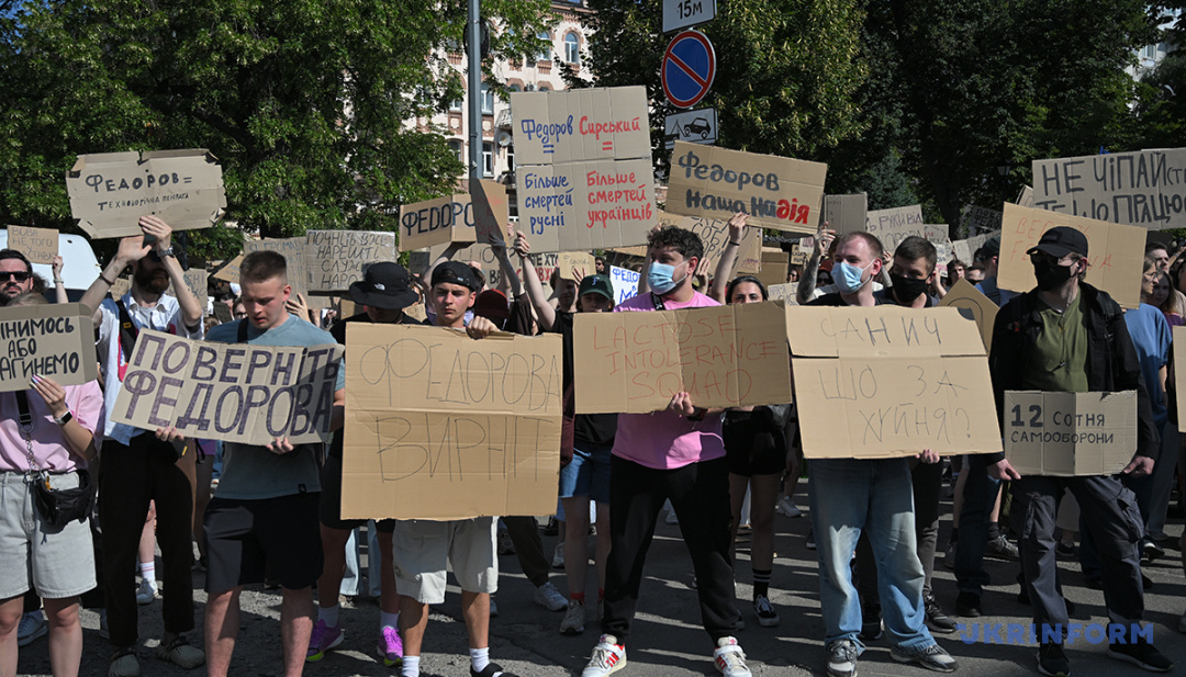 cardboard protests against zelenskyy's firing fedorov erupt across ukraine · post protesters hold signs rally defense minister mykhailo fedorov's dismissal kyiv 16 2026 read bring back = technological genius more