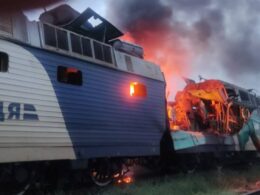The image shows a train in Ukraine on fire, hit by a Russian drone. Source: Oleksii Kuleba