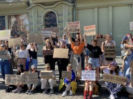cardboard protests against zelenskyy's firing fedorov erupt across ukraine · post rally support dismissed defense minister mykhailo odesa 16 2026 signs read bring back ministry needs don't change what works