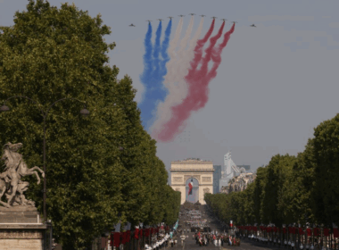 The French Air and Space Force's national aerobatic team performs a flypast during the annual Bastille Day military parade on the Champs-Élysées, with the Arc de Triomphe in the background, Paris, France, 14 July 2026. Photo: AP/Thomas Padilla