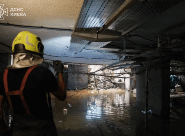 Ukrainian rescuers inside a residential building where 11 people died in a Russian attack, reportedly in a shelter located in the basement.