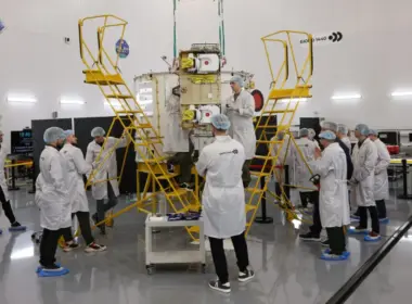 Employees of Russian company Bureau 1440 work on a Rassvet communications satellite.