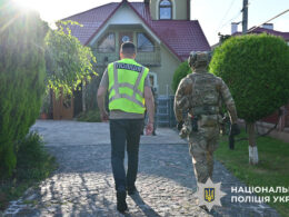 A Ukrainian police officer and Security Service officers during an operation. Source: National Police of Ukraine