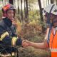 A Ukrainian and a French firefighter are shaking hands during the mission in France. Source: The Ukrainian State Emergency Service