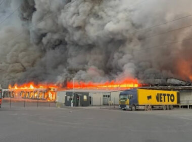 A fire burns at a Nova Poshta fulfillment and sorting center in Sviatopetrivske, Kyiv Oblast, after a Russian drone strike on 28 August 2026. More than 60,000 books were destroyed in the attack. Photo: Readeat