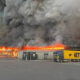 A fire burns at a Nova Poshta fulfillment and sorting center in Sviatopetrivske, Kyiv Oblast, after a Russian drone strike on 28 August 2026. More than 60,000 books were destroyed in the attack. Photo: Readeat
