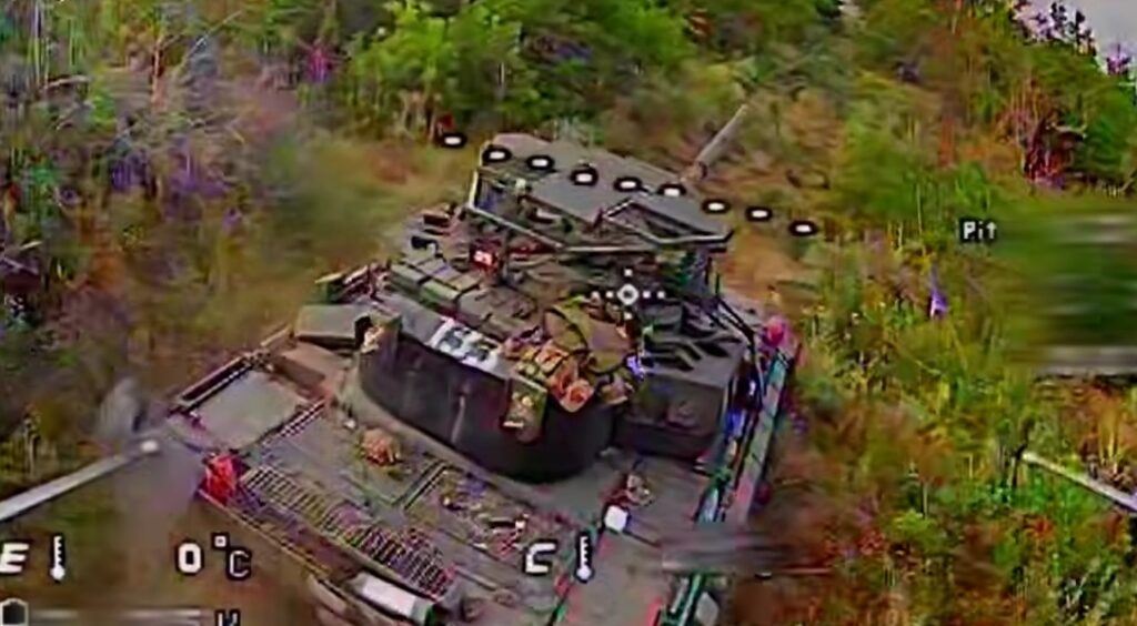 Moment of impact of the T-72B3M tank “133,” equipped with the Arena active protection system and empty countermeasure launcher cells.