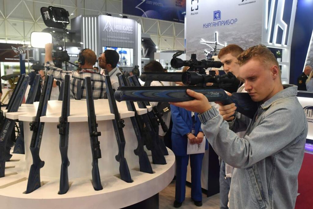 Small-arms sights on display at the booth of Russia’s Shvabe Holding, part of state-owned Rostec, at the MILEX-2025 arms exhibition in Minsk, Belarus. Credit: Mikhail Voskresensky/RIA Novosti