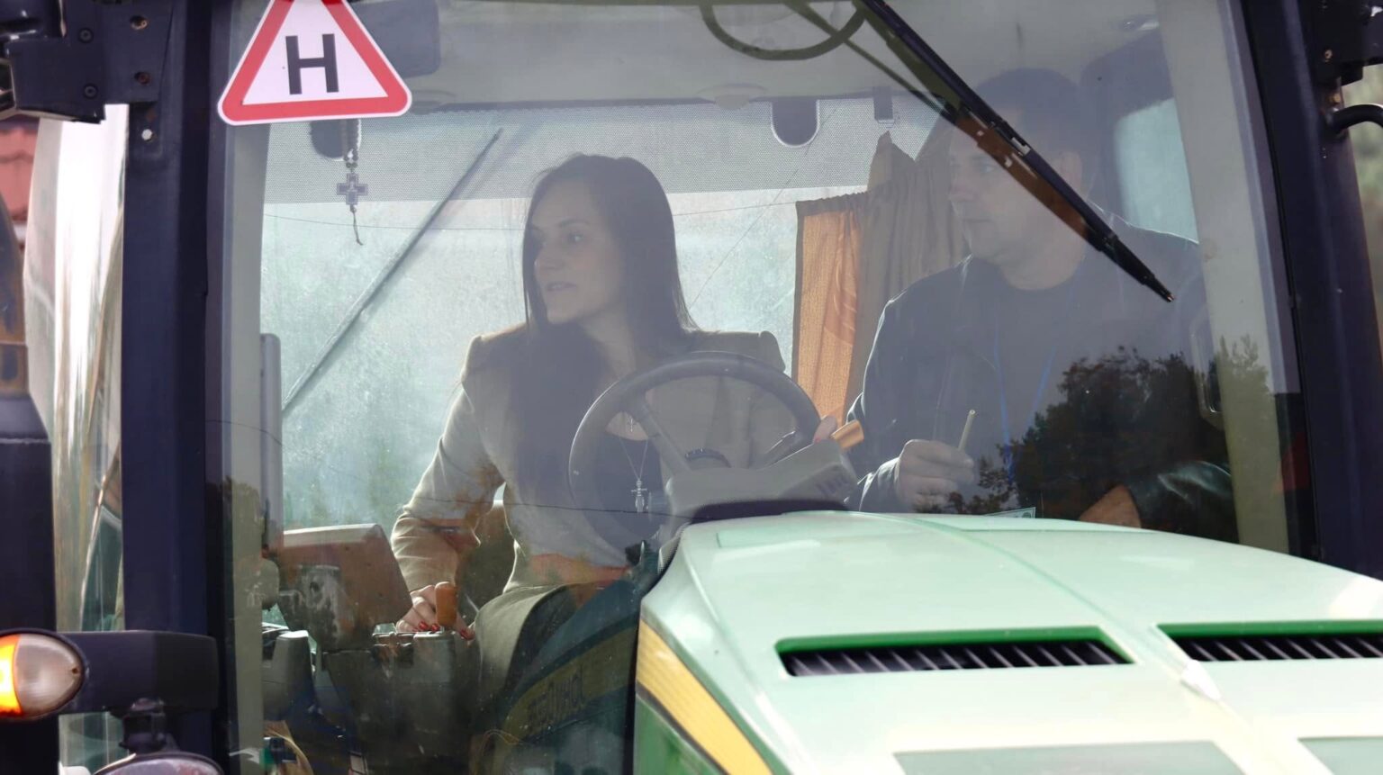 A woman drives a tractor in Ukraine. Then-Deputy Economy Minister Tetyana Berezhna said agricultural companies in Poltava Oblast had begun ordering state-funded tractor training for women as part of a program opening traditionally male-dominated professions to female workers. Photo: Tetyana Berezhna/Facebook
