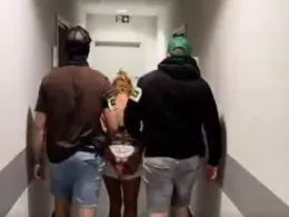 polish prosecutors charge woman over attack ukrainian children consulate says siblings were targeted speaking · post police escort one two women detained connection ukrainians poznań poland 14 2026 marcin kierwiński/x