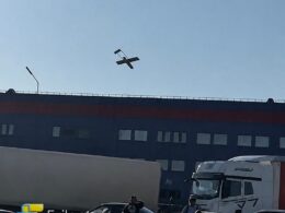 one russian warehouse smolders near kazakhstan while bigger fire rages st petersburg · post ukrainian drone over ozon logistics complex orenburg russia 23 2026 fp-1 hitting ozone exilenova ukraine news