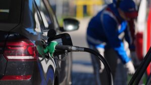 a car refuels at a gas station russia as gasoline shortage deepens