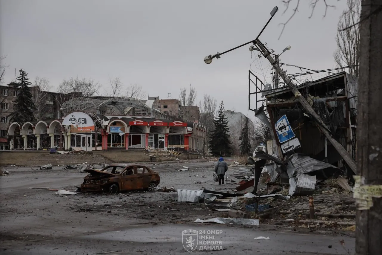 Destroyed buildings and a burned car amid Russia’s Donetsk advance in Kostiatynivka.