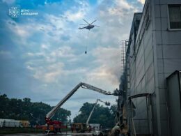 A Ukrainian helicopter is seen at the site of Russia's ballistic missile impact on 5 August 2026, in Kyiv Oblast. Source: State Emergency Service of Kyiv Oblast