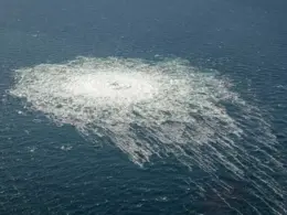 Gas bubbles churn the Baltic Sea above a leak in the Nord Stream 2 pipeline on 27 September 2022.