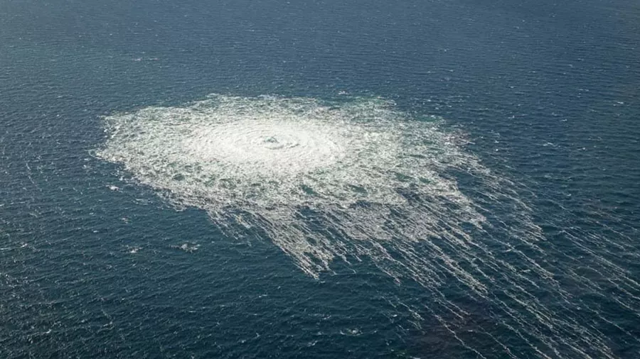 Gas bubbles churn the Baltic Sea above a leak in the Nord Stream 2 pipeline on 27 September 2022.