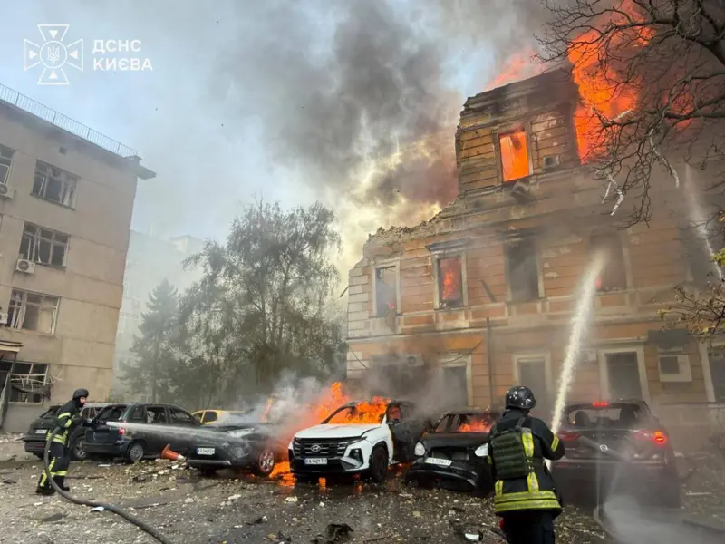 russia hits kharkiv high-rise overnight injuring 43 people strikes central kyiv dnipro broad daylight · post firefighters put out fires main building national academy sciences ukraine burning cars after russian