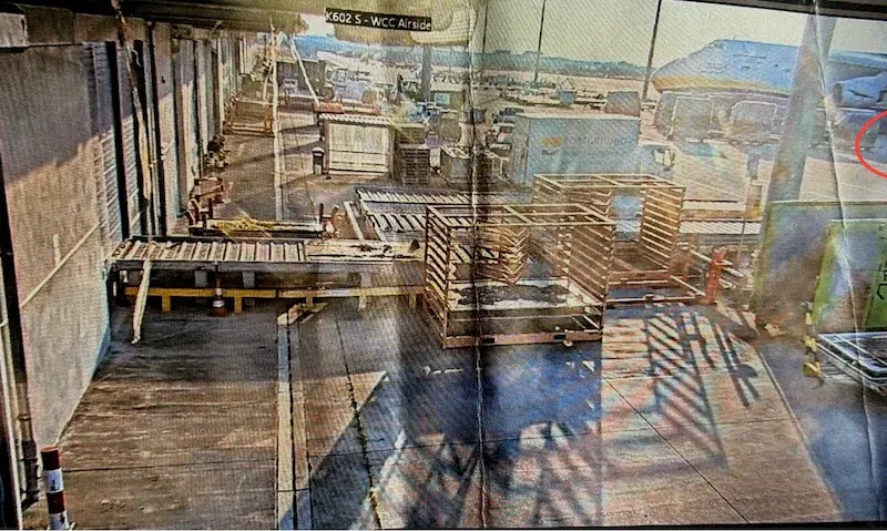 russian intelligence operative belarusian petty criminal germany identifies leipzig bomb-drone suspects · post surveillance camera frame drone circled lying beside ukrainian antonov cargo aircraft leipzig/halle airport 4 2026 footage shows