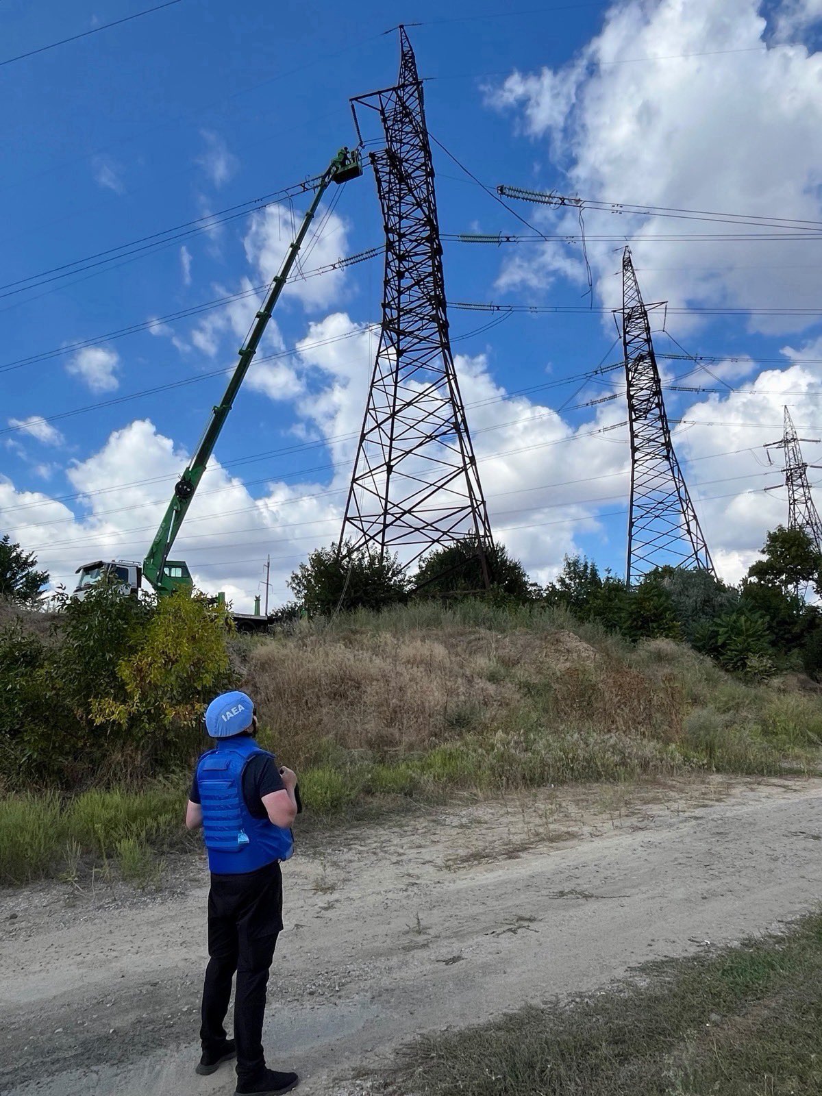 ukrainian technicians restored external power occupied zaporizhzhia nuclear plant after almost three weeks diesel · post iaea staff member watches repairs ferosplavna-1 line supplies 7 2026 hroczxbaoaa0tpe ukraine news reports