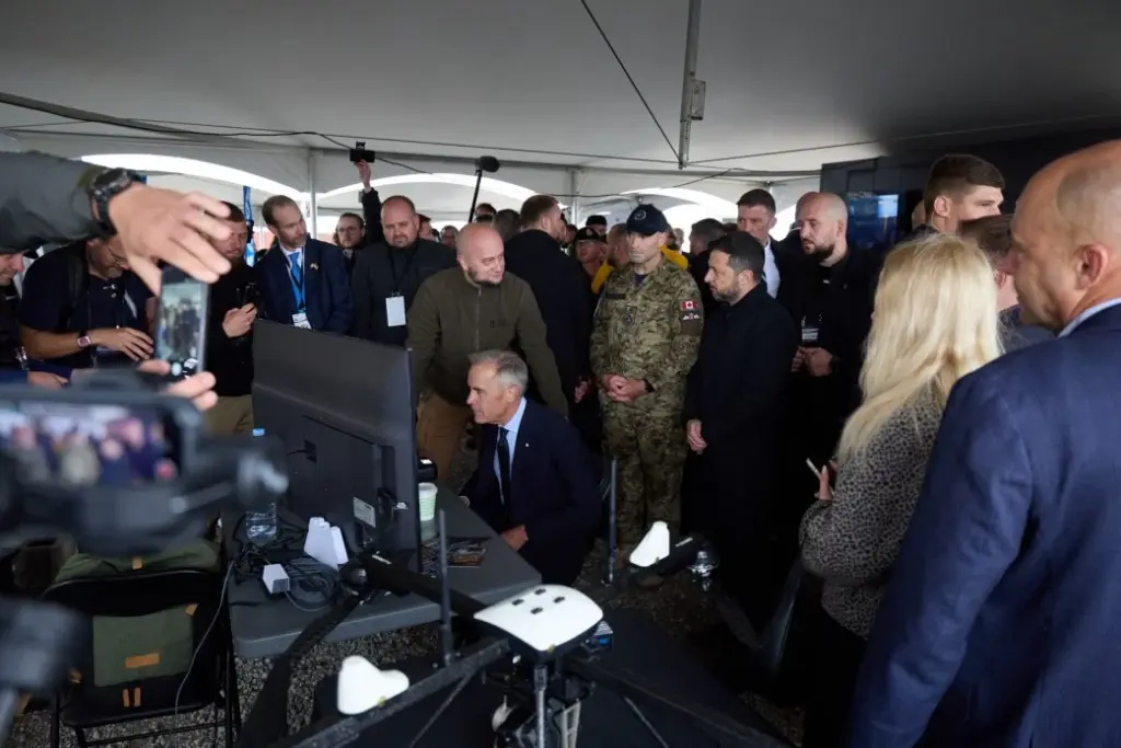 ukrainian drones showcased canada kyiv ottawa broaden defense cooperation · post canadian prime minister mark carney sits drone control station president volodymyr zelenskyy looks during presentation calgary 10 2026 joint