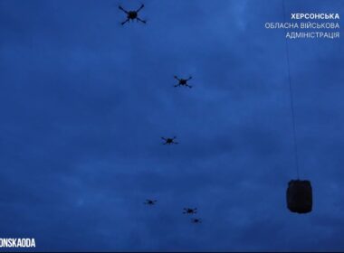 russia holds 2000 people hostage oleshky without food water—ukraine flew 4000 kg locals across dnipro · post drones carry packages starving residents russian-occupied kherson oblast 2026 lifting boxes ukraine news