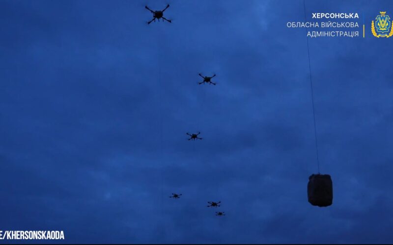 russia holds 2000 people hostage oleshky without food water—ukraine flew 4000 kg locals across dnipro · post drones carry packages starving residents russian-occupied kherson oblast 2026 lifting boxes ukraine news