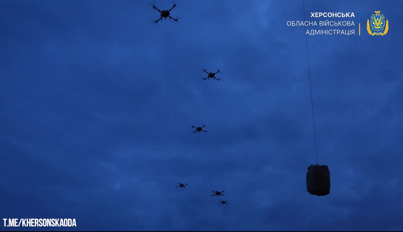 russia holds 2000 people hostage oleshky without food water—ukraine flew 4000 kg locals across dnipro · post drones carry packages starving residents russian-occupied kherson oblast 2026 lifting boxes ukraine news