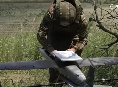 A pilot prepares the Hornet UAV for takeoff. Screenshot from Army Media video
