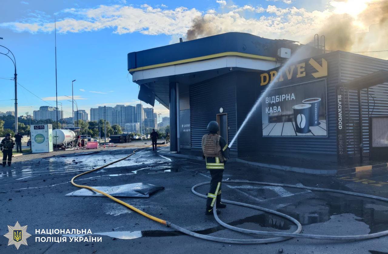 russian drones killed man injured eight kyiv hitting two gas stations · post firefighter extinguishes burning shop ukrnafta station struck drone ukraine 15 2026 police5280922930982363336 news ukrainian reports
