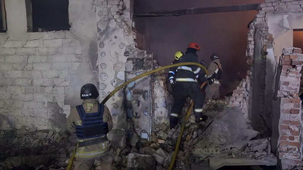 Rescuers work at a damaged building in Ivano-Frankivsk after a Russian drone attack, 9 October 2026