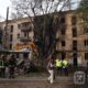 russian strike collapses kharkiv apartment stairwell killing three · post rescuers clear rubble excavator building hit kharkiv’s kholodnohirskyi district ukraine 13 2026 oda news ukrainian reports